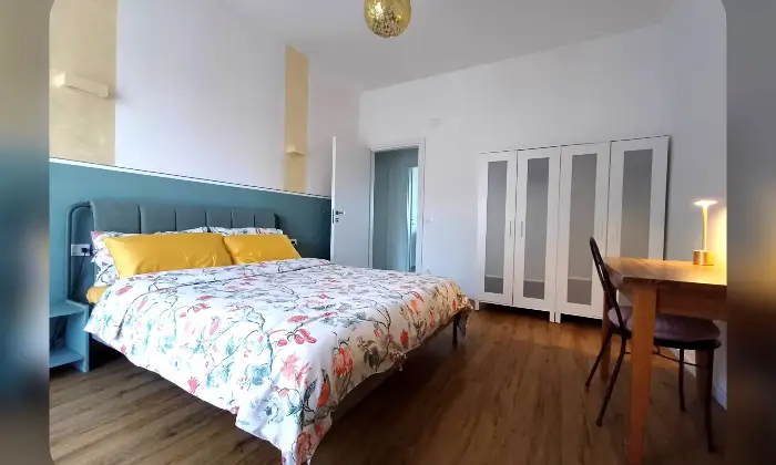 Rexer-Firenze-Accogliente-appartamento-di-design-pronto-per-essere-vissuto-con-CIN-Camera-da-letto-matrimoniale