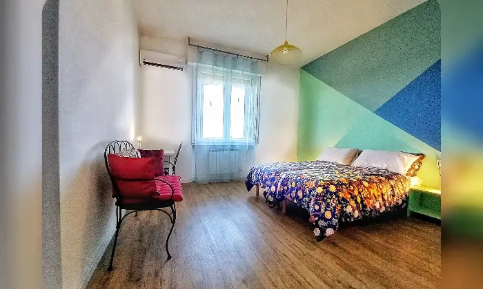 Rexer-Firenze-Accogliente-appartamento-di-design-pronto-per-essere-vissuto-con-CIN-Camera-da-letto