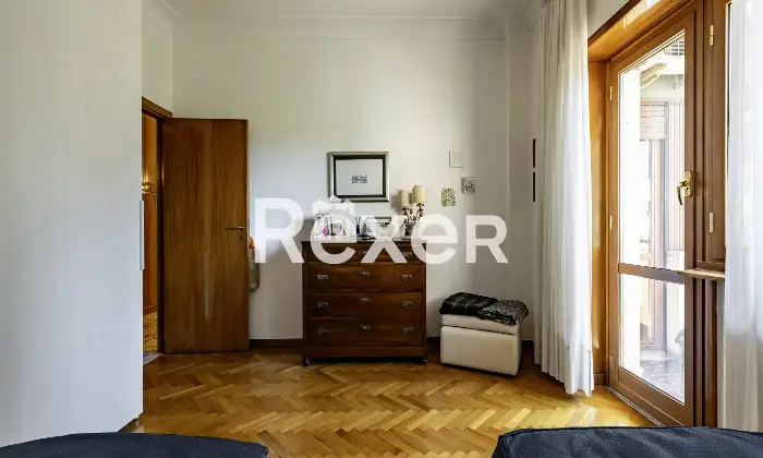Rexer-Roma-Appartamento-in-Via-Deruta-con-box-auto-Altro