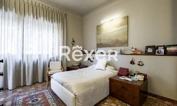 Rexer-Roma-Appartamento-in-Via-Deruta-con-box-auto-Altro