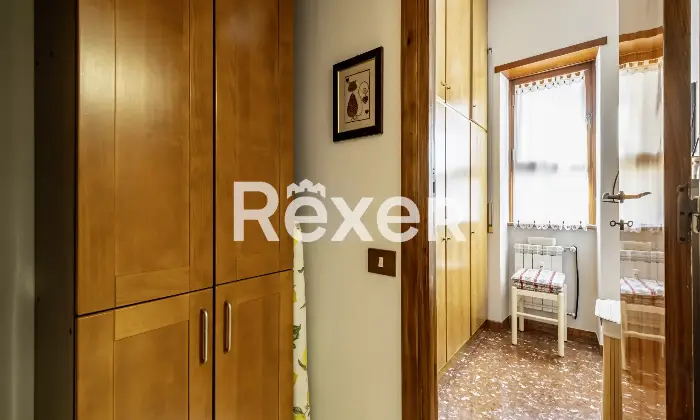 Rexer-Roma-Appartamento-in-Via-Deruta-con-box-auto-Altro