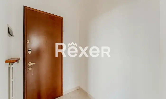 Rexer-Carpiano-Appartamento-con-terrazzo-abitabile-e-box-auto-Altro