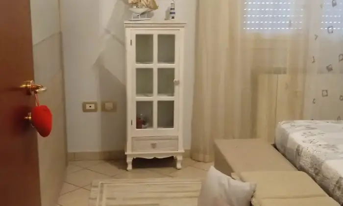 Rexer-Porto-Tolle-Appartamento-con-terrazzi-box-e-posto-auto-in-centro-Camera-da-letto-matrimoniale
