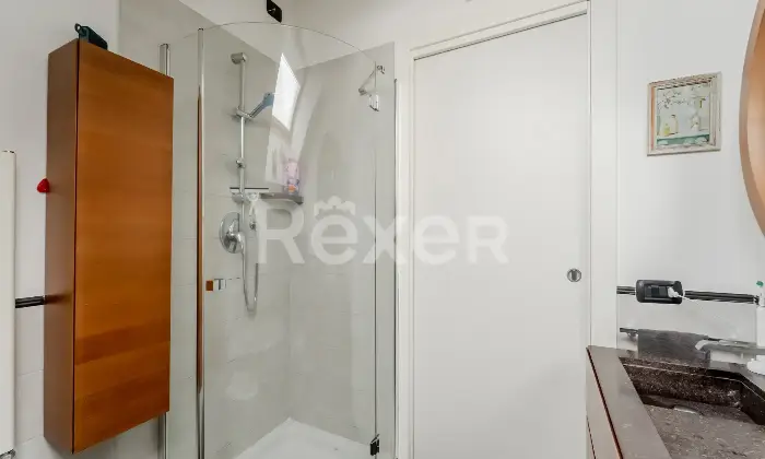 Rexer-Settimo-Milanese-Appartamento-mansardato-con-terrazzo-e-balconi-Box-Recente-costruzione-Altro