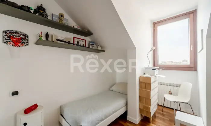 Rexer-Settimo-Milanese-Appartamento-mansardato-con-terrazzo-e-balconi-Box-Recente-costruzione-Altro