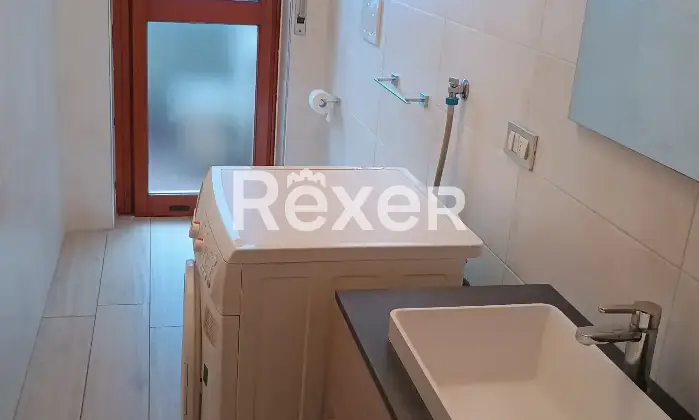 Rexer-Gallarate-Quadrilocale-con-doppi-servizi-e-box-auto-in-edificio-signorile-anni-Altro