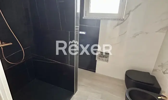 Rexer-Budoni-Casa-con-finiture-di-pregio-e-piscina-mt-dalla-spiaggia-Bagno