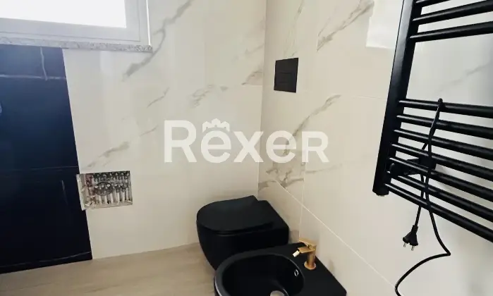 Rexer-Budoni-Casa-con-finiture-di-pregio-e-piscina-mt-dalla-spiaggia-Bagno