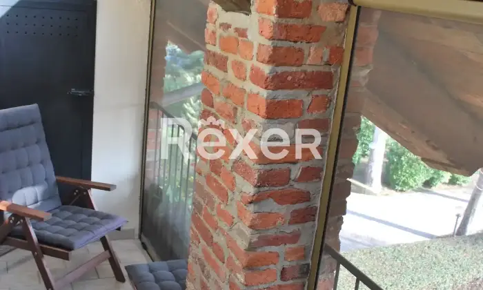 Rexer-San-Carlo-Canavese-Esclusiva-Mansarda-in-Raffinato-Contesto-Residenziale-Balcone