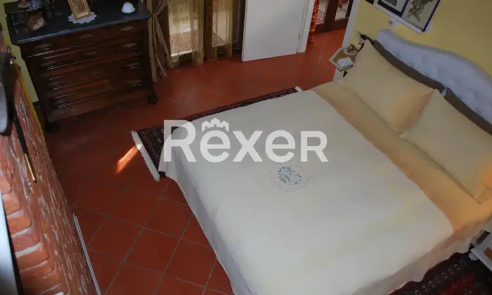 Rexer-San-Carlo-Canavese-Esclusiva-Mansarda-in-Raffinato-Contesto-Residenziale-CameraDaLetto