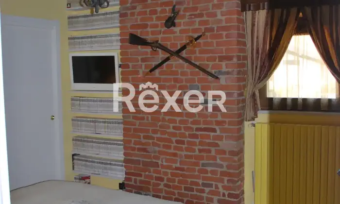 Rexer-San-Carlo-Canavese-Esclusiva-Mansarda-in-Raffinato-Contesto-Residenziale-Camera-da-letto