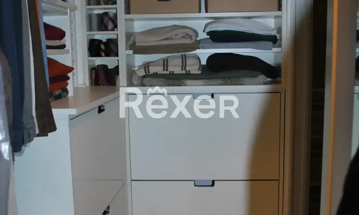 Rexer-San-Carlo-Canavese-Esclusiva-Mansarda-in-Raffinato-Contesto-Residenziale-Cabina-armadio