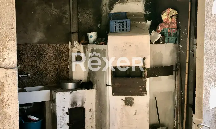 Rexer-Modica-Oasi-Siciliana-antica-dimora-con-uliveti-e-carrubbe-Cucina