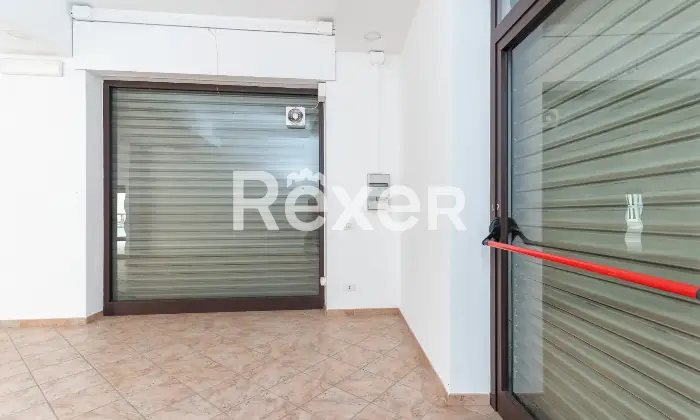 Rexer-Spezzano-Albanese-Intero-stabile-residenziale-con-due-locali-commerciali-Altro