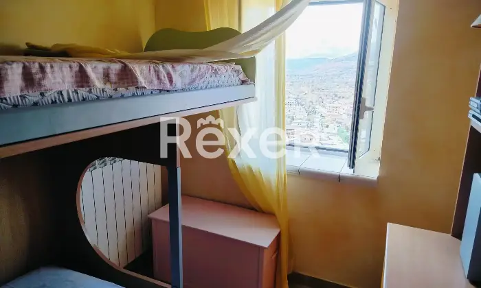 Rexer-Celano-Casa-in-vendita-nel-cuore-del-centro-storico-di-Celano-CameraDaLetto