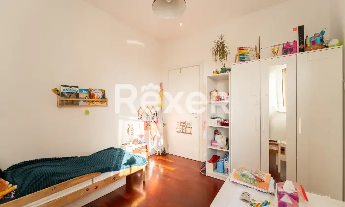 Rexer-Milano-Ultimo-piano-luminoso-con-balcone-e-box-Altro