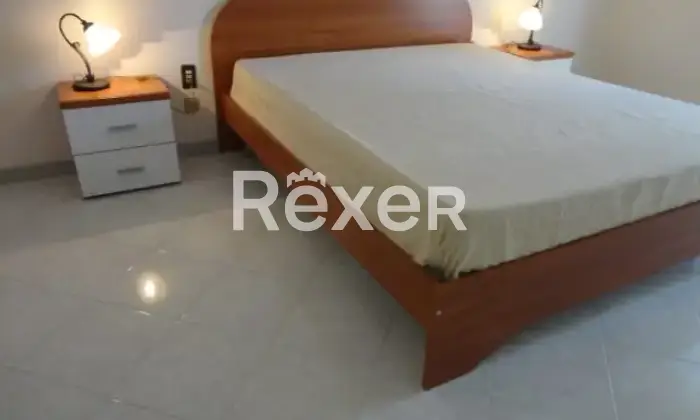 Rexer-Marsala-Luminoso-e-accogliente-appartamento-Marsala-CameraDaLetto