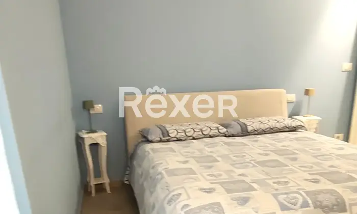 Rexer-Comacchio-Elegante-appartamento-a-soli-mt-dal-mare-CameraDaLetto