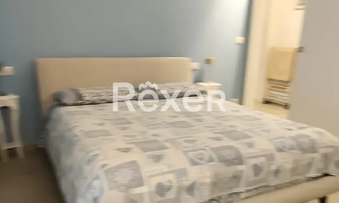 Rexer-Comacchio-Elegante-appartamento-a-soli-mt-dal-mare-CameraDaLetto