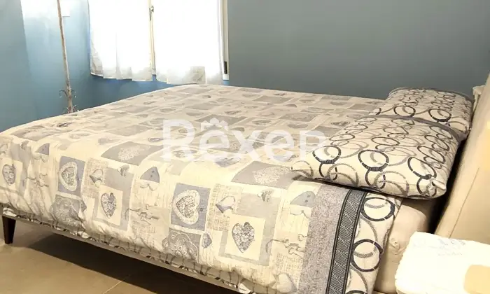Rexer-Comacchio-Elegante-appartamento-a-soli-mt-dal-mare-CameraDaLetto