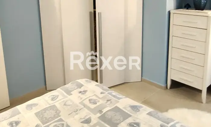 Rexer-Comacchio-Elegante-appartamento-a-soli-mt-dal-mare-CameraDaLetto