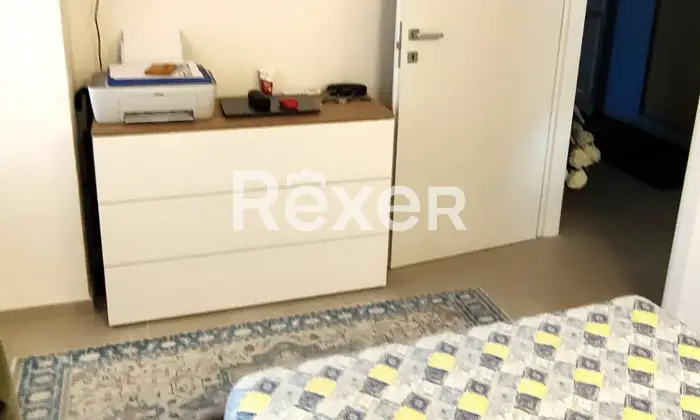 Rexer-Comacchio-Elegante-appartamento-a-soli-mt-dal-mare-CameraDaLetto