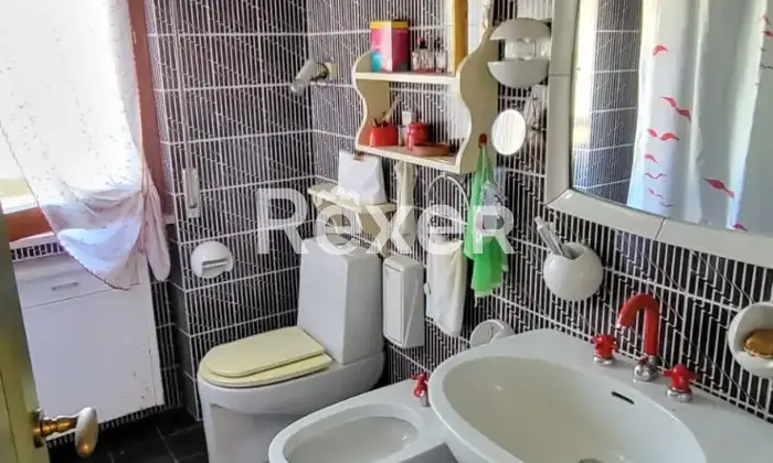 Rexer-Nuoro-Appartamento-Via-Lombardia-angolo-Via-Veneto-sito-al-piano-Bagno