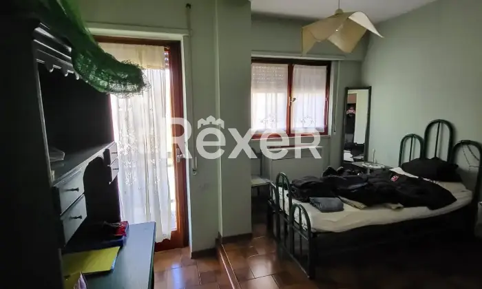 Rexer-Nuoro-Appartamento-Via-Lombardia-angolo-Via-Veneto-sito-al-piano-Camera-da-letto