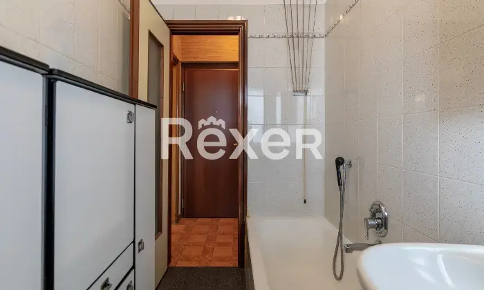 Rexer-Milano-Ampio-trilocale-con-doppio-ingresso-e-balcone-Altro