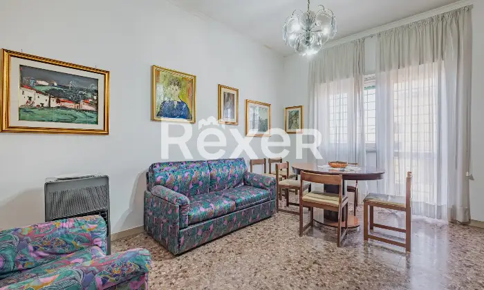 Rexer-Roma-trilocale-piano-alto-con-box-auto-Altro