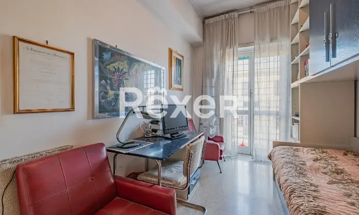 Rexer-Roma-trilocale-piano-alto-con-box-auto-Altro