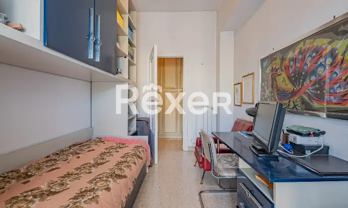 Rexer-Roma-trilocale-piano-alto-con-box-auto-Altro