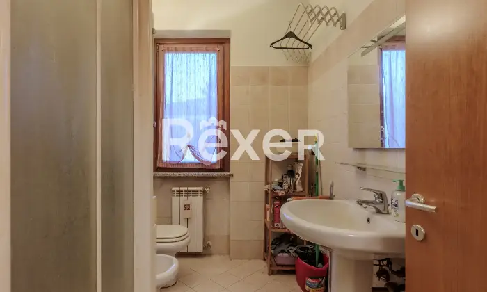 Rexer-Capriate-San-Gervasio-Ampio-bilocale-con-balcone-e-garage-Bagno