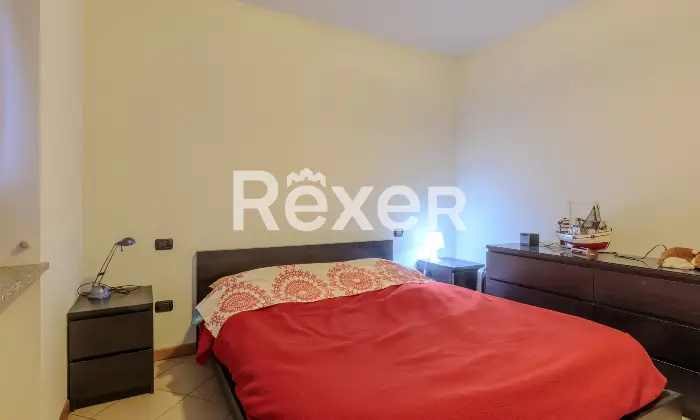 Rexer-Capriate-San-Gervasio-Ampio-bilocale-con-balcone-e-garage-Camera-da-letto-matrimoniale