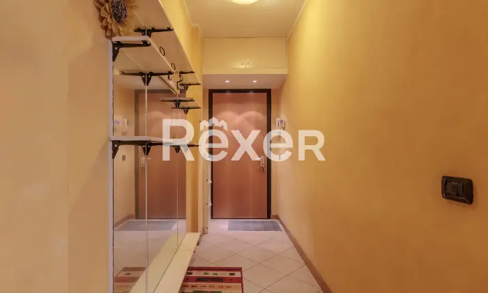 Rexer-Capriate-San-Gervasio-Ampio-bilocale-con-balcone-e-garage-Corridoio