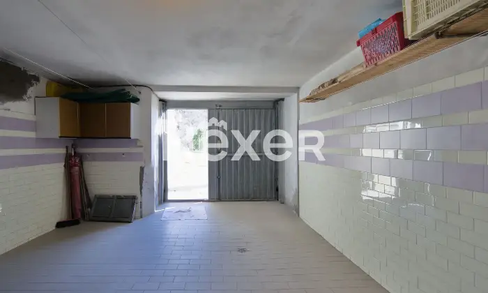 Rexer-Villagrande-Trilocale-con-box-auto-in-edificio-storico-ristrutturato-Box