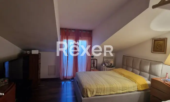 Rexer-Martinsicuro-Appartamento-Duplex-e-piano-attico-CameraDaLetto