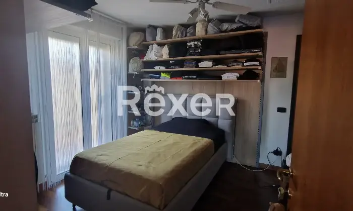 Rexer-Martinsicuro-Appartamento-Duplex-e-piano-attico-CameraDaLetto