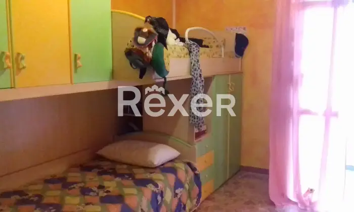 Rexer-Giave-Ampio-Appartamento-CameraDaLetto