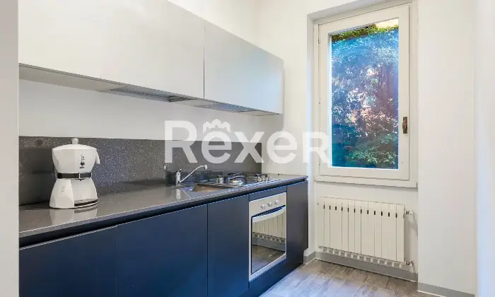 Rexer-Brescia-Ampio-Bilocale-con-posto-auto-coperto-Altro