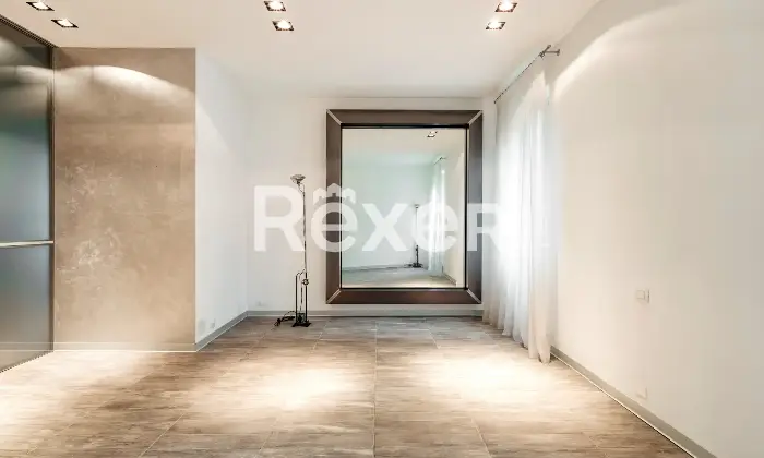 Rexer-Brescia-Ampio-Bilocale-con-posto-auto-coperto-Altro