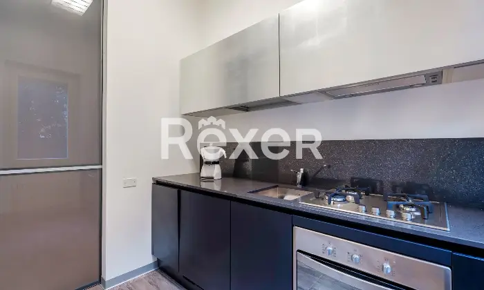 Rexer-Brescia-Ampio-Bilocale-con-posto-auto-coperto-Altro