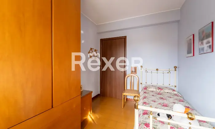 Rexer-Rho-Villetta-a-schiera-con-box-Altro