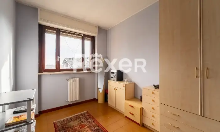 Rexer-Rho-Villetta-a-schiera-con-box-Altro