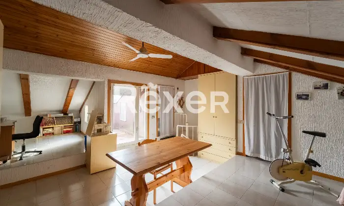 Rexer-Rho-Villetta-a-schiera-con-box-Altro