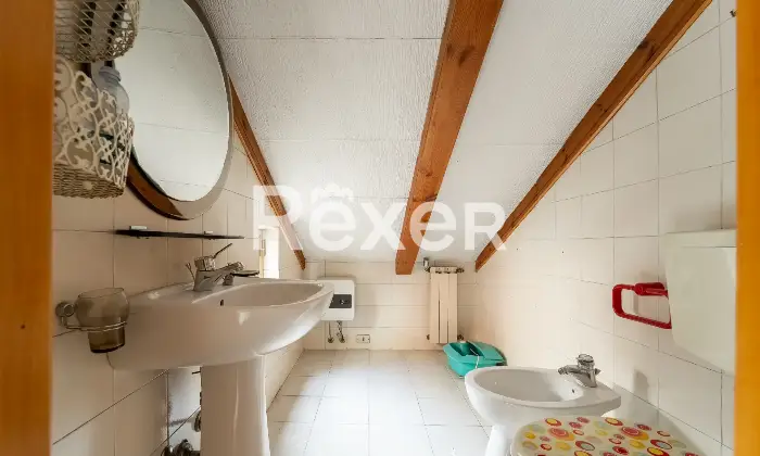 Rexer-Rho-Villetta-a-schiera-con-box-Altro