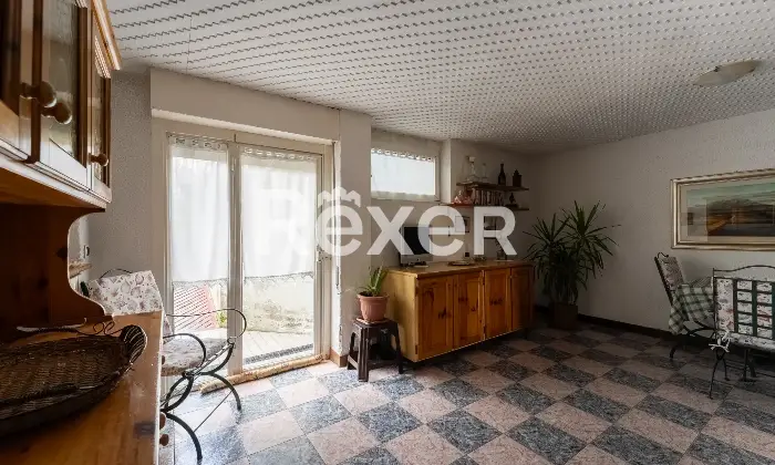 Rexer-Rho-Villetta-a-schiera-con-box-Altro