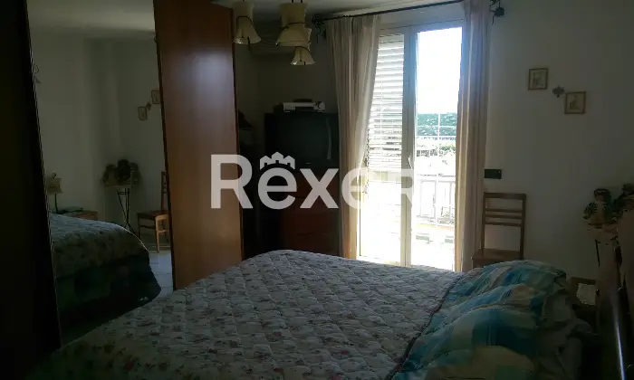 Rexer-Barcellona-Pozzo-di-Gotto-APPARTAMENTO-PANORAMICO-VISTA-ISOLE-EOLIE-MILAZZO-E-MARINELLO-ARREDATO-CameraDaLetto