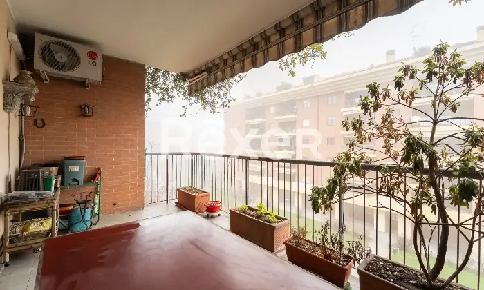 Rexer-Milano-Luminoso-quadrilocale-con-terrazzino-cantina-e-box-auto-Terrazzo