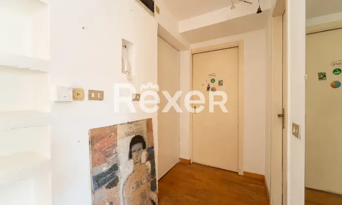Rexer-Milano-Ultimo-piano-bilocale-facilmente-trasformabile-Ingresso